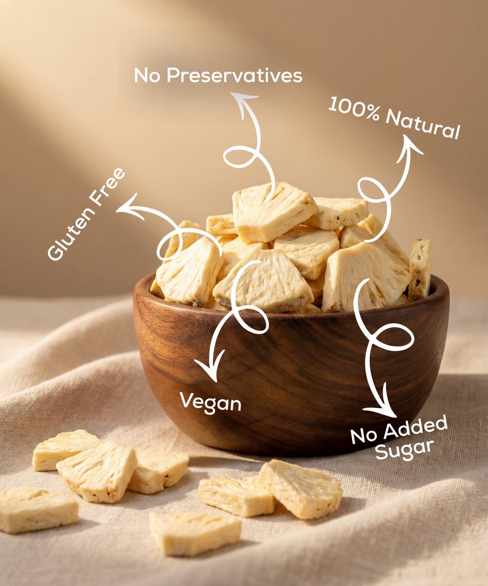 Moon Freeze Dried Pineapple by Themoonstoreindia shown in a wooden bowl on a beige cloth—a healthy snack that's gluten-free, vegan, 100% natural, with no added sugar or preservatives.