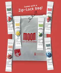 A Lunar Hydration Booster Variety Pack by MOONFREEZE FOODS PRIVATE LIMITED, featuring five fruit-flavored sachets and a zip-lock bag, sits on a red background. This set ensures essential electrolytes with every sip.